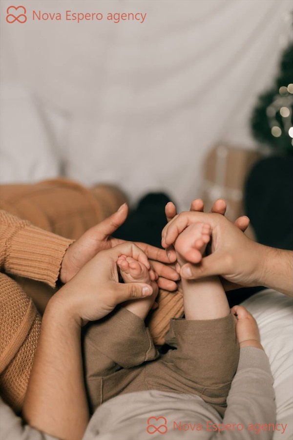 Intended parents with their baby after a surrogacy journey